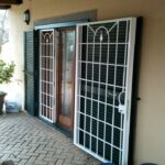 Griglia porta di sicurezza con persiane