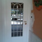 Porta di sicurezza con vetro e griglia